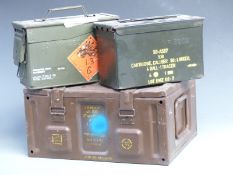 Three military ammunition boxes