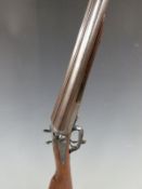 Edwinson Green & Son 12 bore side by side hammer action shotgun with all over ornate scrolling