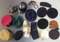 A collection of hats comprising No1 dress hat Royal Gloucestershire Hussars, Corker black motorcycle