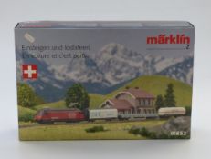 Marklin Z gauge Swiss Freight train set 81852, in original box with two additional coaches
