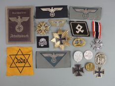 A quantity of German WWII and later insignia