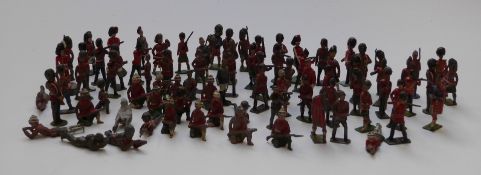 Eighty-four Britains and similar lead model soldiers including Highlanders and bandsmen