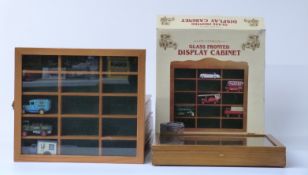 Six wooden and glass diecast model vehicle display cabinets each 29.5 x 33.5cm, one in original box