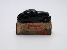 Schuco clockwork tinplate model Command Car A.D. 2000 with navy blue body, metal hubs and embossed