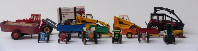 Eighteen Britains, Corgi, ERTL and similar diecast model agricultural vehicles and farm implements