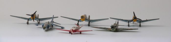 Six Dinky Toys diecast model aeroplances including three Junkers Ju 87B Stuka 721, one with original