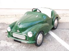 Morris 1000 Junior pedal car in green, produced by The Morris Minor Centre of Bath, with opening