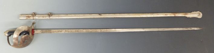 An Italian 1888 sword with 82cm engraved blade with scabbard.