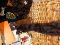 A wicker hamper of vintage textiles and accessories including boxed Hermes tie, Paul Costelloe