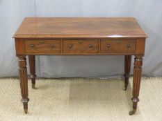 A 19thC mahogany desk or centre table with three drawers to one side and false drawers to the other,