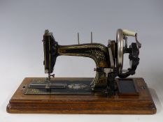 Hengstenberg & Co. Germany sewing machine with mother of pearl inlay, circa 1898, retailed by A.W.