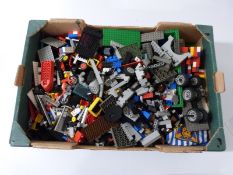 Over 5.5kg of loose Lego pieces including people, wheels and shaped bases