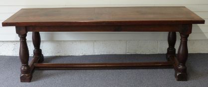 An oak two plank top refectory table, L219 x D74 x H73cm