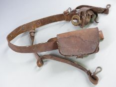 American Civil War era leather belt with two pouches, the larger one stamped C S Arsenal, Baton