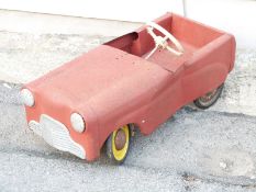 Vintage Lines Brothers Ltd (Tri-ang) metal pedal car with red body, yellow hubs and named tyres