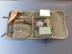 Russian machine gun cleaning kit including bottles, spanners, parts etc in a canvas and leather