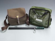 A collection of shooting related items comprising a cartridge bag, 20 bore shotgun cartridge belt, a