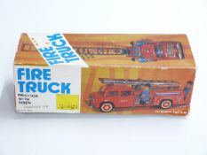 Japanese friction powered tinplate model Fire Truck, in original box
