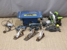 Xtreme table saw, Evolution chop saw, Extreme planer, Draper jigsaw and a Black and Decker sander