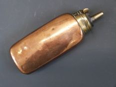 Colt style copper and brass pistol powder flask, 11cm long.