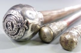 Three swagger sticks, one hallmarked silver mounted
