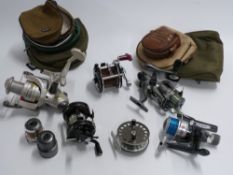 Six fishing reels including Sigma and Shakespeare.
