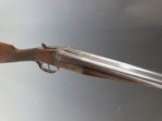 BSA 12 bore side by side shotgun with engraved lock, chequered grip and forend, double trigger and