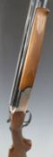 Franco Beretta 12 bore over and under ejector ejector shotgun with all over scrolling engraving,