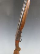 G Gamba-Gardone 12 bore single barrelled folding shotgun with chequered semi-pistol grip and forend,