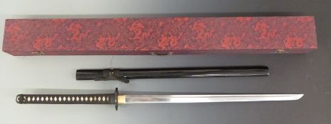 A cased modern Samurai sword. Blade length 70cm.