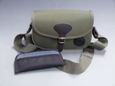 David Nickerson canvas and leather cartridge bag together with a Beretta choke case.