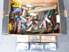 Eighty-five Hornby, Bachmann, Mainline and similar 00 gauge wagons coaches and cranes, some in