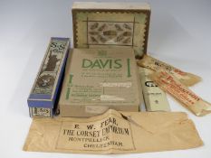 Vintage clothing packaging including Corset Emporium, Montpellier, Cheltenham and an Austin Reed