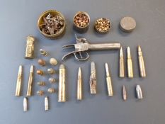 A collection of gun parts and accessories including percussion pistol lock and barrel, percussion