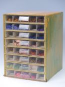 Thiriez and Cartier-Bresson haberdashery/ shop chest of eight drawers containing silk embroidery