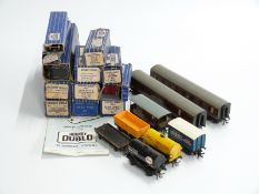 Twenty Hornby Dublo 00 gauge coaches, wagons and tankers, 12 in original boxes
