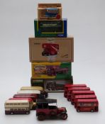 Sixteen mainly Corgi diecast model buses and lorries including Eddie Stobart, The Showmans Range