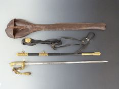 A British Naval officer's sword engraved to Lt Michael Brian Vansittart Moorhouse, with belt and