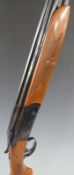 Valmet 12 bore over and under shotgun with pattern engraved locks, single trigger, chequered and