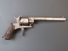 Belgian 7mm pinfire six-shot double action revolver with moulded Bakelite grips, line engraved