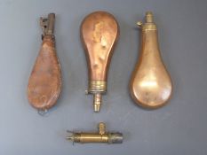 Two copper and brass powder flasks one Dixon & Sons (19.5cm long) the other Sykes (20cm long)
