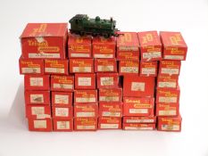 Thirty eight Tri-Ang 00 gauge locomotives, coaches, wagons and accessories, all but one in