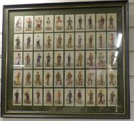 A framed set of Territorial Army uniform cigarette cards, 50 in total