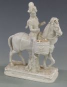 A porcelain figure of a Napoleonic Imperial Guard drummer on horseback, marked Germany to base, 28cm