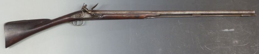 Daykin 18 bore flintlock hammer action sporting gun with named and engraved lock, iron butt plate,