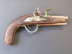 Flintlock hammer action pistol with brass mounts and 3.75 inch part octagonal barrel, overall length