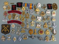 A collection of British Army cap badges, bi-metal / staybrite, including Scots Dragoon Guards, Royal