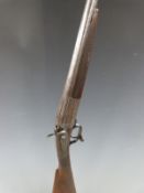 Clough 12 bore single barrel hammer action shotgun with named and engraved lock, fine scrolling