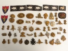 British Army collection of cap badges and rank badges including Cheshire Yeomanry, The Loyal