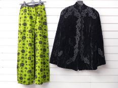 Victorian velvet cape and a green skirt